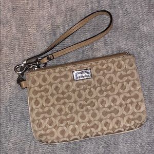 Lightly Worn Tan COACH Wristlet